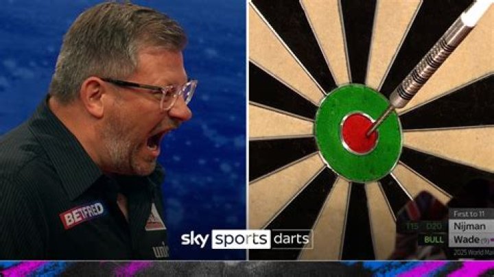 Greg James finishes his Gregathlon for Sport Relief